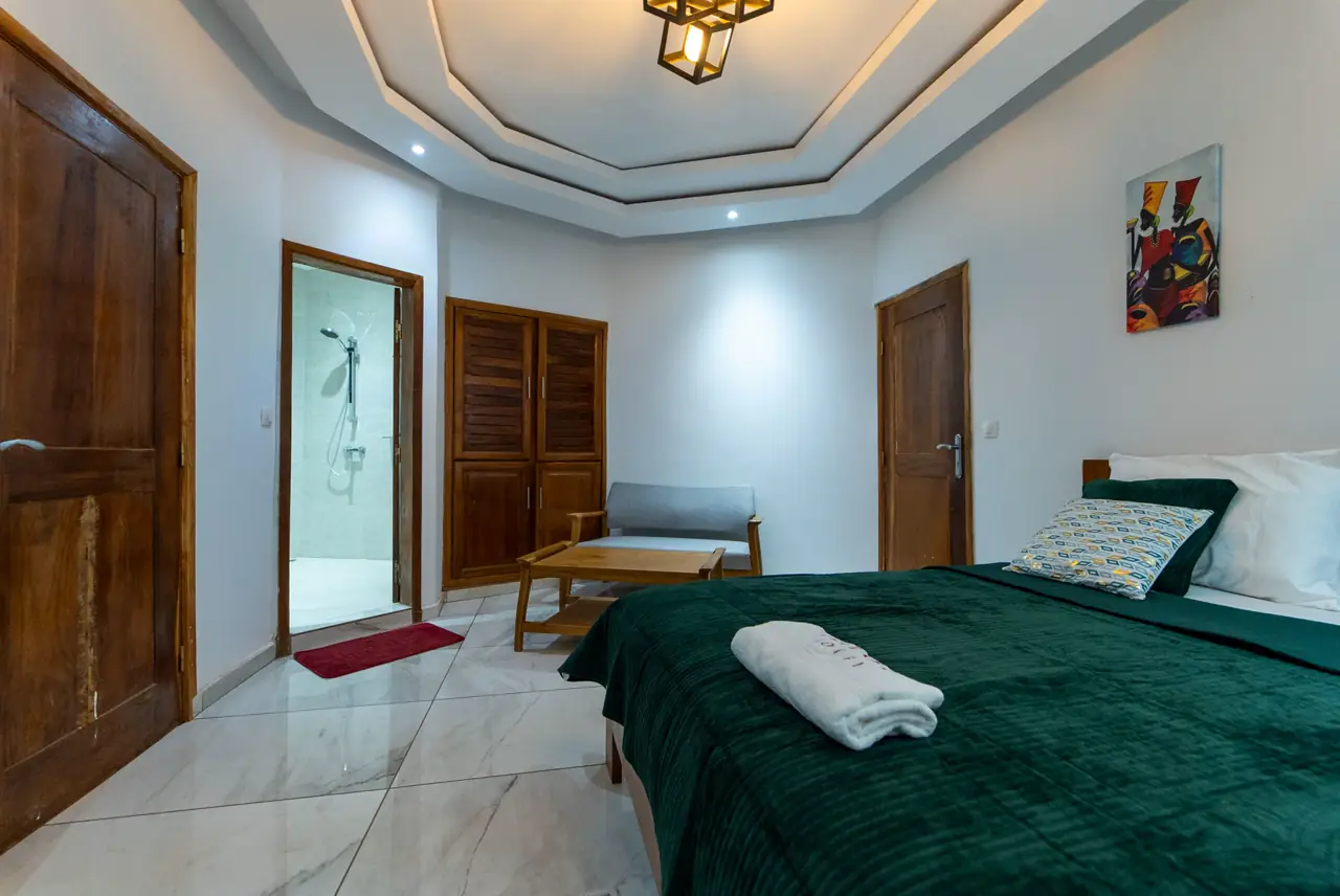 Chambre Exécutive du Dehaly Hôtel, sol en marbre et coin salon